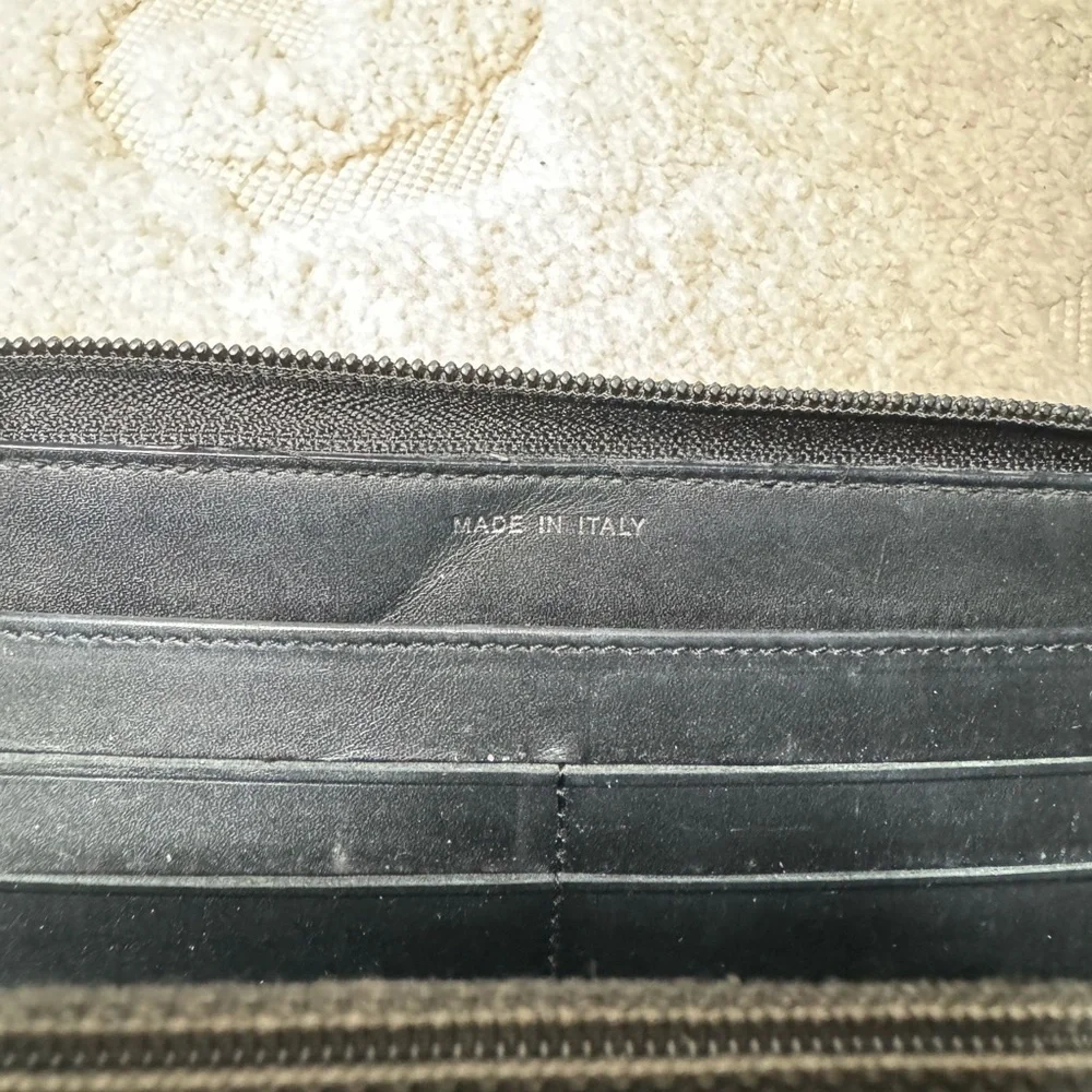 Authentic Chanel Camelia patent leather‎ zip around wallet long